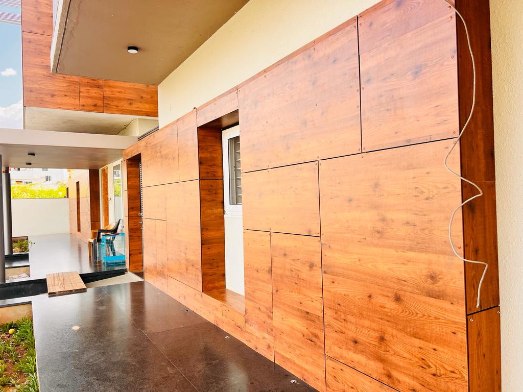 Fundermax woodlook - wood-look hpl exterior installation Kochi Kerala | Precise Homes