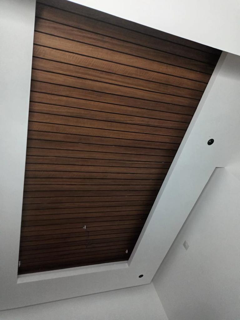LG Hausys ceiling - ceiling panel feature installation Ernakulam Kerala | Precise Homes