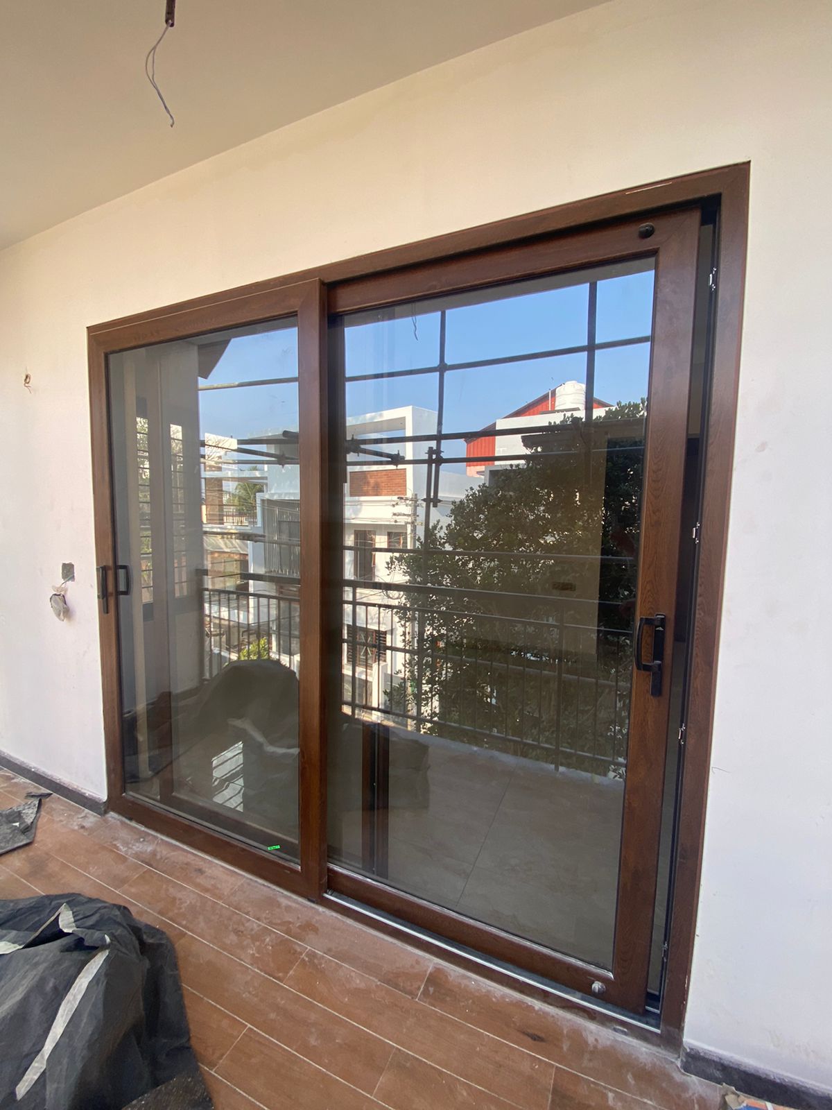 Saint-Gobain panel - large panel glazing installation Ernakulam Kerala | Precise Homes